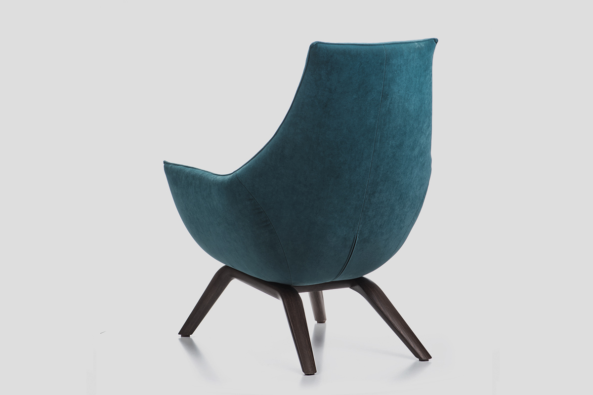 Modern upholstered armchair comfort with solid wood legs Serbia manufacture Linea Milanovic